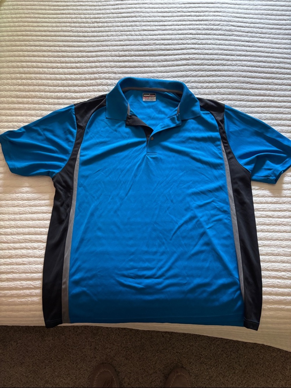 Grand Slam Blue Polo with Black Accents